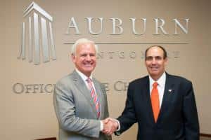 a man wearing a suit and tie a man wearing a suit and tie