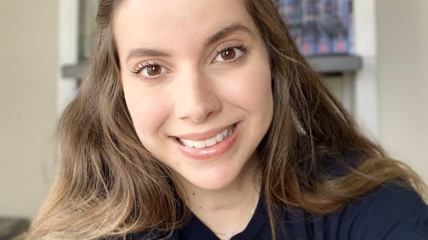A Woman Smiling For The Camera