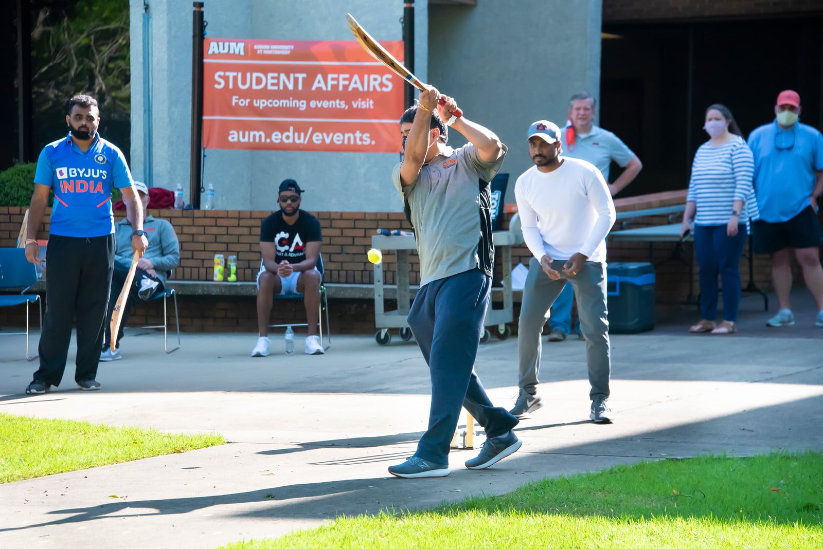 a group of people walking down the street