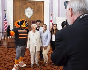Kay Ivey et al. standing in front of a crowd
