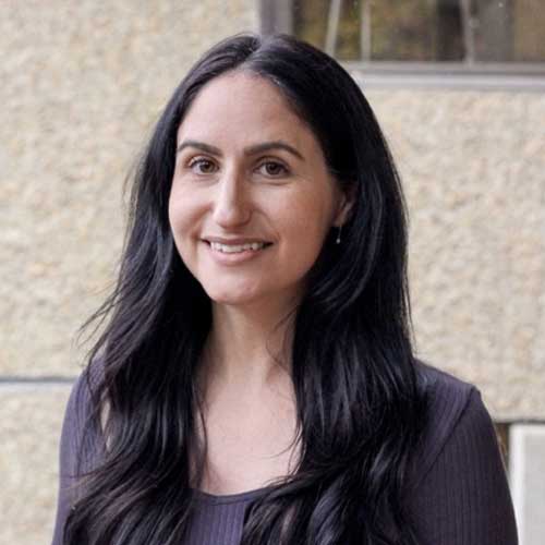 a woman smiling for the camera