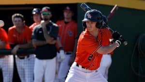 a baseball player holding a bat