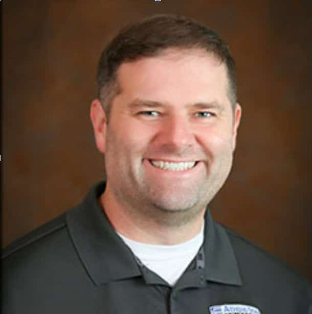 a man smiling for the camera