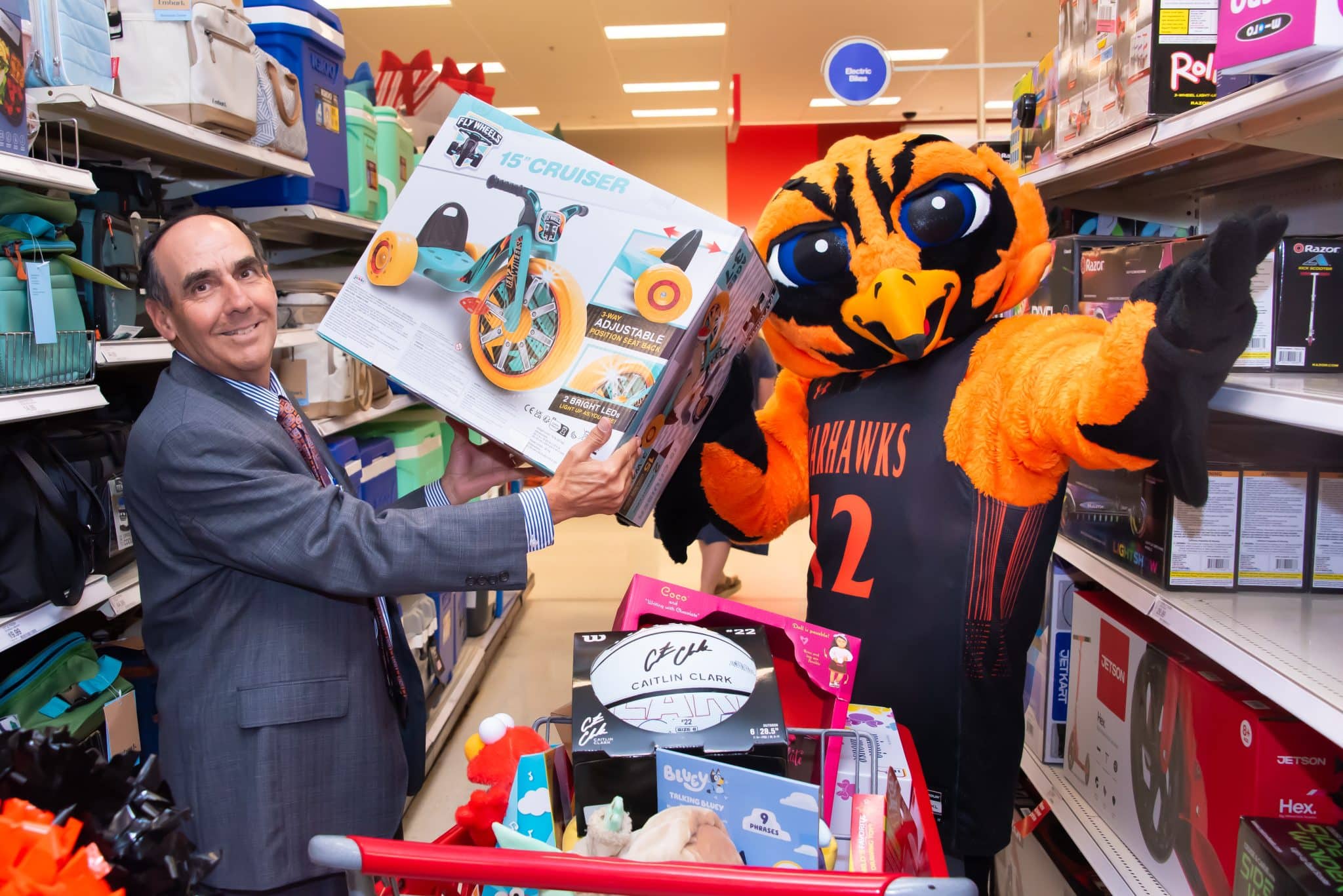 Curtiss and Chancellor Stockton pick out toys for WSFA 12 Days of Giving.