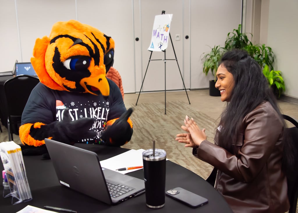 Curtiss helps with tutoring at Tacos with Tutors.