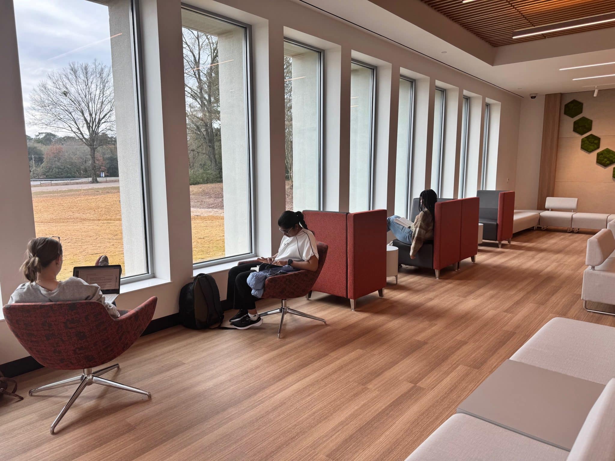 Students lounge in the entry to the new Science & Technology Complex.