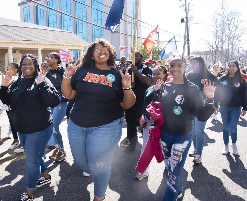 Students march in support of Higher Education Day.