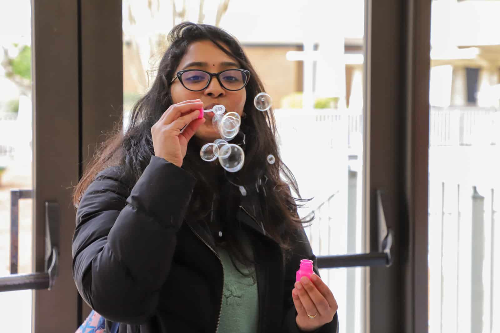 Students blew bubbles in the Taylor Center