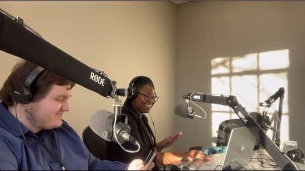 AUM students Auburn University at Montgomery students Nicholas Cutrell (left) and Shaniece McGhee work on their podcast at the Southeast Journalism Conference