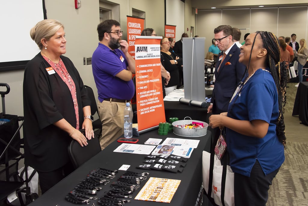 Potential students inquire about graduate programs.