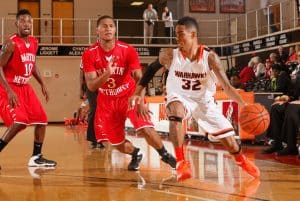 AUM basketball player No. 32 Brandon Howard competes on the court.