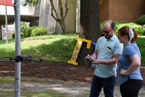 Associate Professor of Fine Arts, Will Fenn, leads a demonstration of drone photography during the arts' summer camps.
