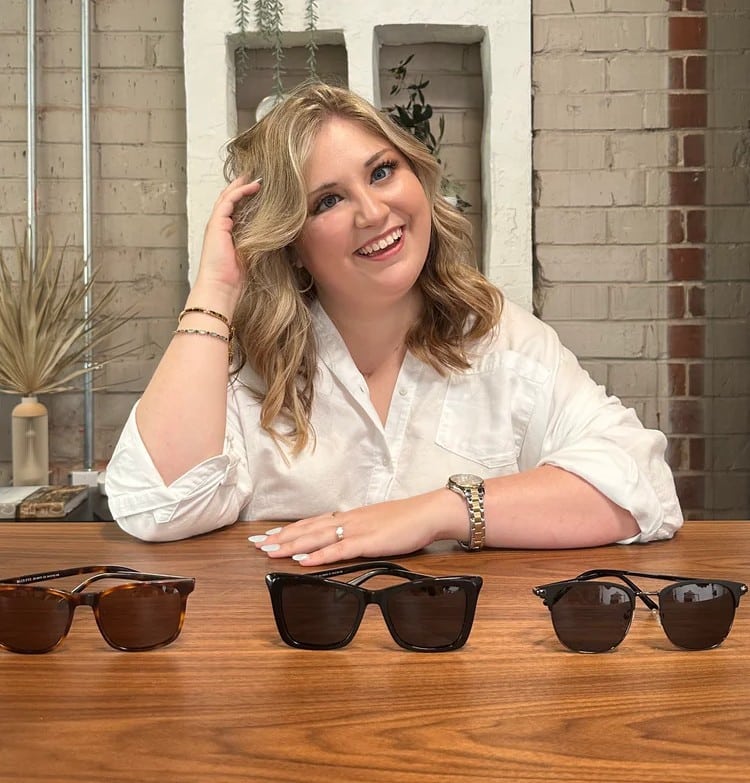 Hannah Oliver shows off her sunglasses.