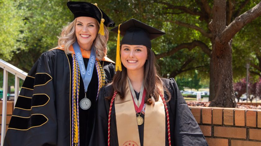Auburn University At Montgomery Graduates In Caps And Gowns Smile On Campus During Commencement, Class Of 2026
